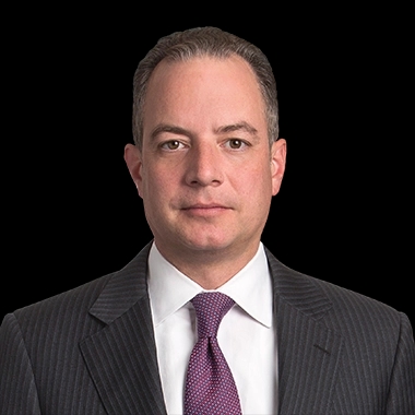 Professional headshot of Reince Priebus